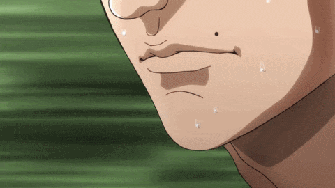 A Close Up Of A Person 'S Face With Sweat Drops On It GIF