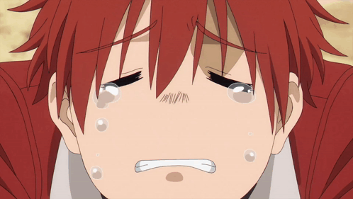 A Close Up Of A Person 'S Face With Tears Coming Out Of Their Eyes GIF