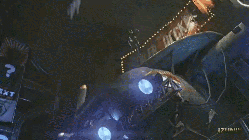 A Close Up Of A Person 'S Face With The Letters Izuniy On The Bottom Right GIF