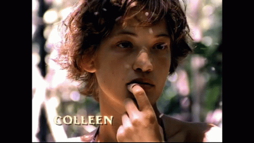A Close Up Of A Person 'S Face With The Name Colleen On It GIF