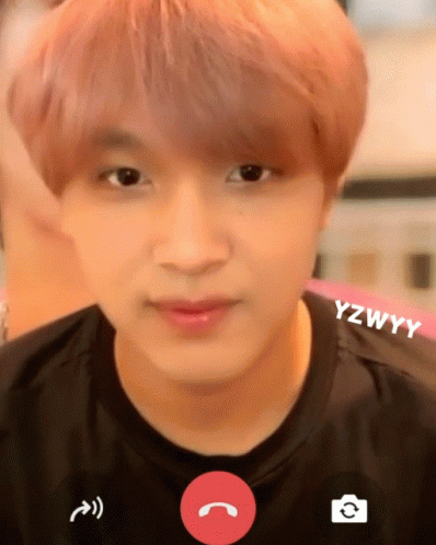 A Close Up Of A Person 'S Face With The Name Yzwwy On The Bottom GIF