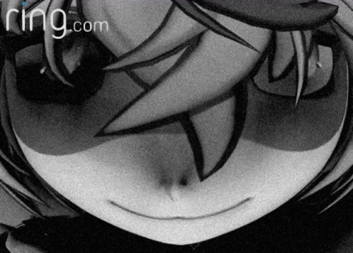 a close up of a person 's face with the website ring.com visible in the background