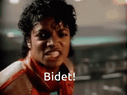 A Close Up Of A Person 'S Face With The Word Bidet Written On It GIF