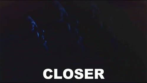 A Close Up Of A Person 'S Face With The Word Closer In White GIF