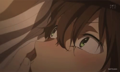 A Close Up Of A Person 'S Face With The Word Mitsukei On The Bottom GIF