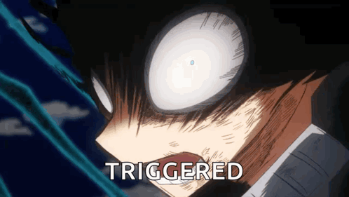 A Close Up Of A Person 'S Face With The Word Triggered On The Bottom Right GIF