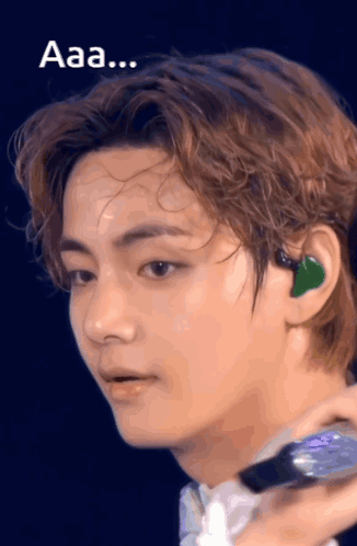 A Close Up Of A Person 'S Face With The Words " Aaa " Below It GIF