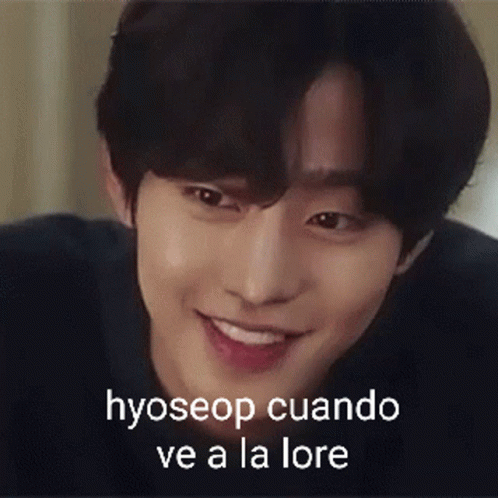 A Close Up Of A Person 'S Face With The Words Hyoseop Cuando Ve A La Lore Written On It . GIF