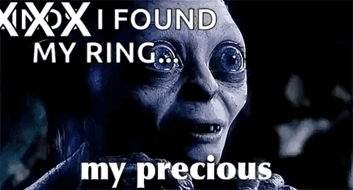 A Close Up Of A Person 'S Face With The Words `` I Found My Ring , My Precious '' . GIF