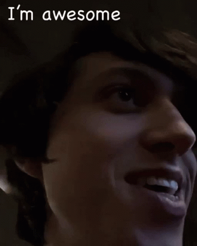 A Close Up Of A Person 'S Face With The Words " I 'M Awesome " Written Above It GIF