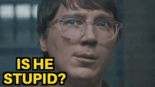 A Close Up Of A Person 'S Face With The Words Is He Stupid Above It GIF