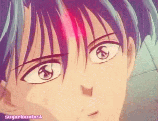 A Close Up Of A Person 'S Face With The Words Sugarbundust Below GIF