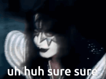 A Close Up Of A Person 'S Face With The Words `` Uh Huh Sure Sure '' . GIF