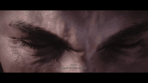A Close Up Of A Person 'S Face With The Words " Wayne " Written On The Bottom GIF