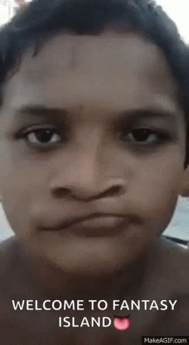 A Close Up Of A Person 'S Face With The Words Welcome To Fantasy Island Written On It GIF