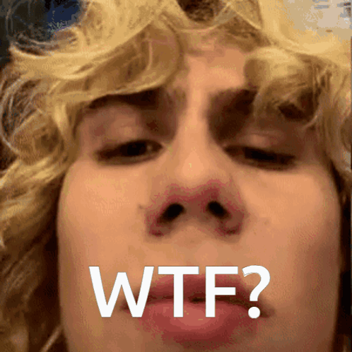 A Close Up Of A Person 'S Face With The Words " Wtf " Written On It GIF