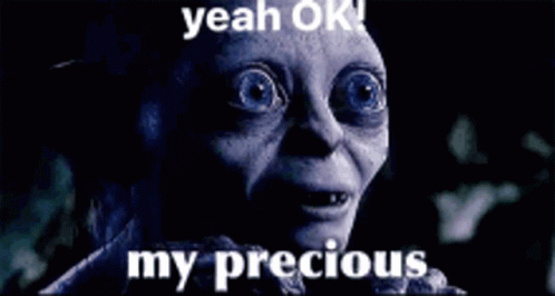 A Close Up Of A Person 'S Face With The Words Yeah Ok My Precious On It GIF