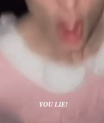 A Close Up Of A Person 'S Face With The Words " You Lie " Above It GIF