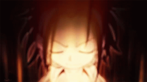 A Close Up Of A Person 'S Face With Their Eyes Closed And A Fire Coming Out Of Their Mouth . GIF