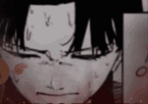 A Close Up Of A Person 'S Face With Their Eyes Closed And A Red Spot On Their Forehead . GIF