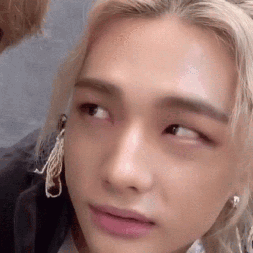A Close Up Of A Person 'S Face With Their Eyes Closed And Their Mouth Open . GIF