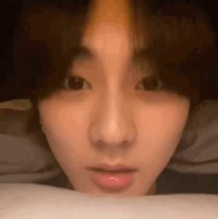 A Close Up Of A Person 'S Face With Their Eyes Closed And Their Mouth Open . GIF