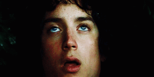 A Close Up Of A Person 'S Face With Their Eyes Looking Up GIF