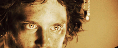 A Close Up Of A Person 'S Face With Their Eyes Looking Up GIF
