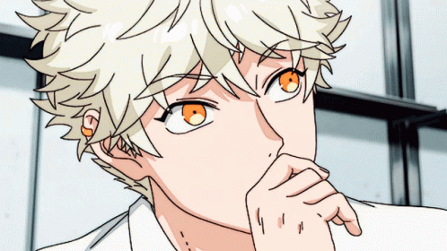 A Close Up Of A Person 'S Face With Their Hand On Their Chin GIF