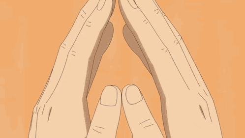 A Close Up Of A Person 'S Face With Their Hands Folded In Front Of Their Face . GIF