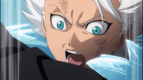 A Close Up Of A Person 'S Face With Their Mouth Open GIF