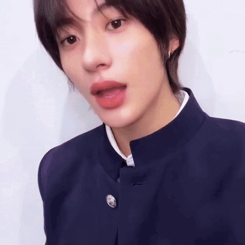 Close Up Of Person's Face With Open Mouth And Blue Jacket GIF