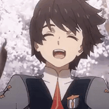 A Close Up Of A Person 'S Face With Their Mouth Open And Their Eyes Closed . GIF