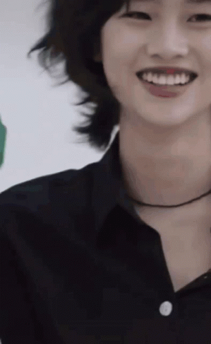 A Close Up Of A Person 'S Face With Their Mouth Open And Their Teeth Showing GIF