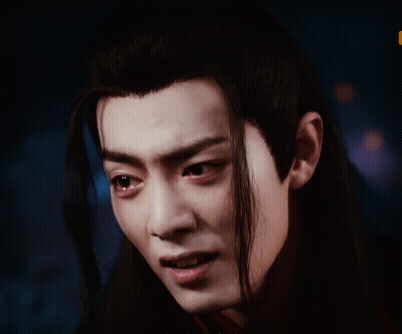 A Close Up Of A Person 'S Face With Their Mouth Open GIF
