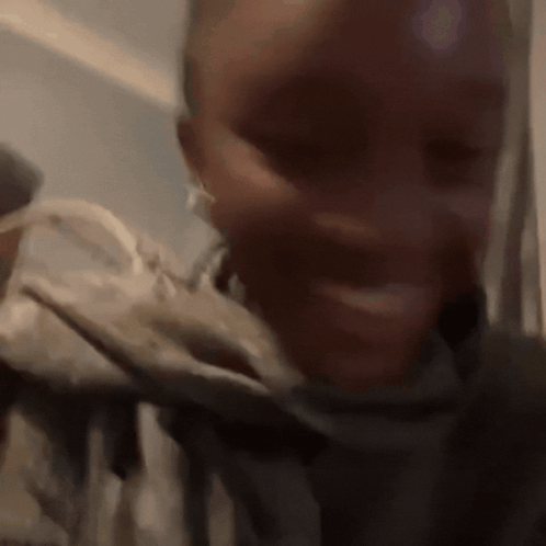 A Close Up Of A Person 'S Face With Their Mouth Open GIF