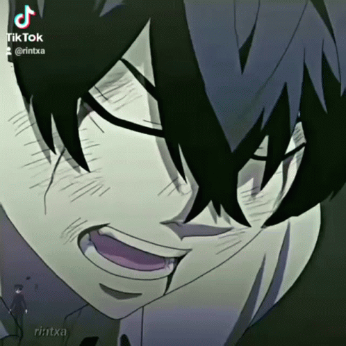 A Close Up Of A Person 'S Face With Tiktok Written On It GIF