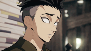 A Close Up Of A Person 'S Face With White Eyes And A Shaved Head GIF