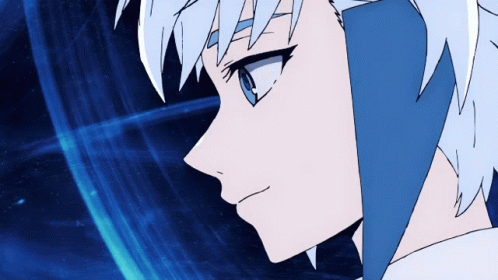 A Close Up Of A Person 'S Face With White Hair And Blue Eyes GIF
