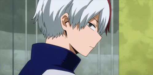 A Close Up Of A Person 'S Face With White Hair And Red Eyes GIF