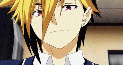 A Close Up Of A Person 'S Face With Yellow Hair GIF