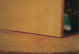 A Close Up Of A Person 'S Feet In Green And White Shoes GIF