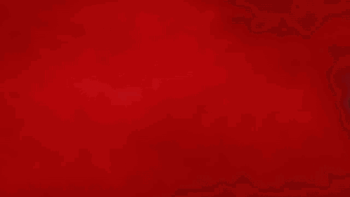 A Close Up Of A Person 'S Fist With A Red Background GIF