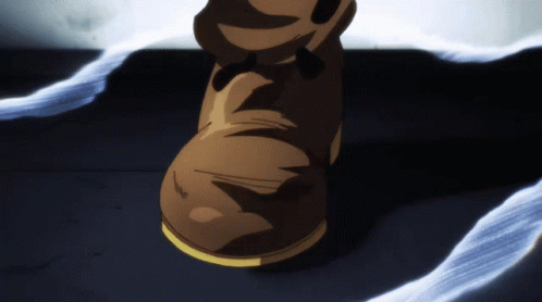 A Close Up Of A Person 'S Foot In A Brown Boot With A Yellow Sole GIF