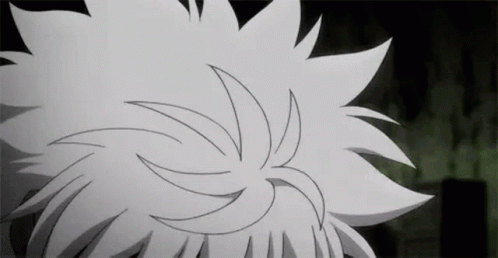 a close up of a person 's hair with a swirl .