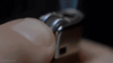 Close Up Of Hand Holding Nail Clipper GIF