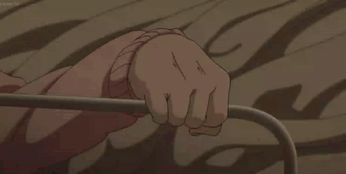 A Close Up Of A Person 'S Hand Holding Onto A Metal Railing GIF