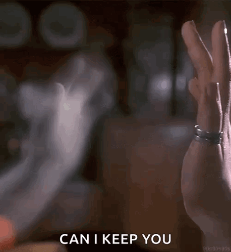 A Close Up Of A Person 'S Hand Making A Peace Sign With The Words Can I Keep You Behind It GIF