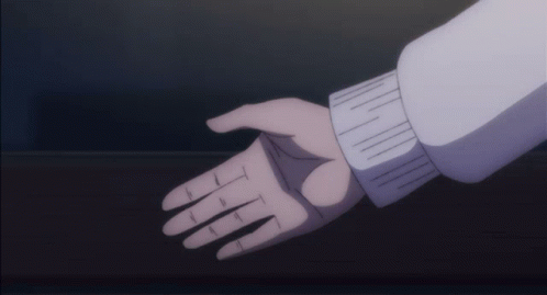 A Close Up Of A Person 'S Hand Reaching Out To Another Person 'S Hand GIF