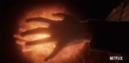 A Close Up Of A Person 'S Hand With Netflix Written On The Bottom Right GIF